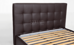 particolare della testata con tiranti - similpelle marrone 